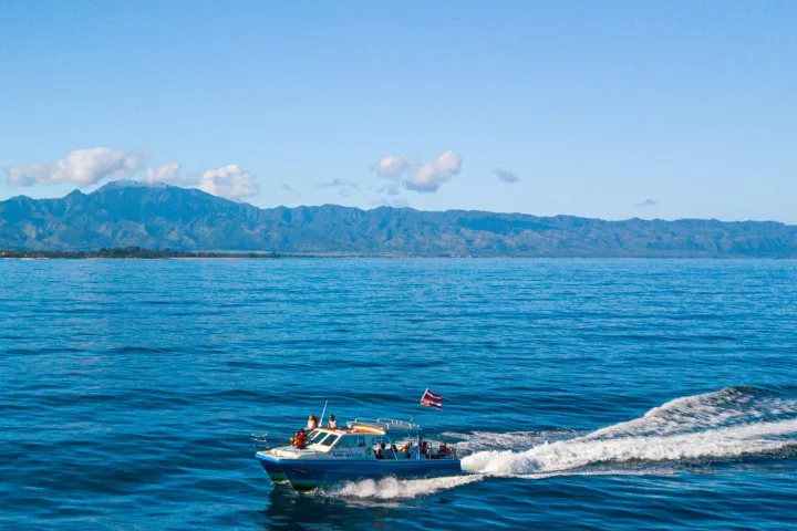 a small boat in a body of water